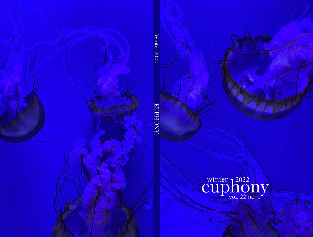 Euphony Winter 2022 Cover: An overwhelmingly blue image, with three blue-purple jellyfish drifting downwards on each side of the cover.